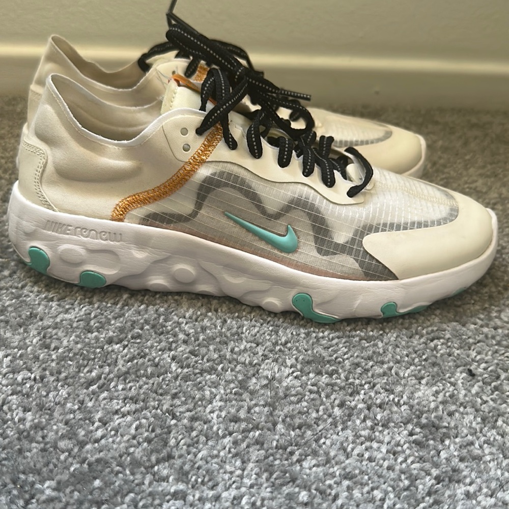 Nike renew white, teal, orange and black laces.